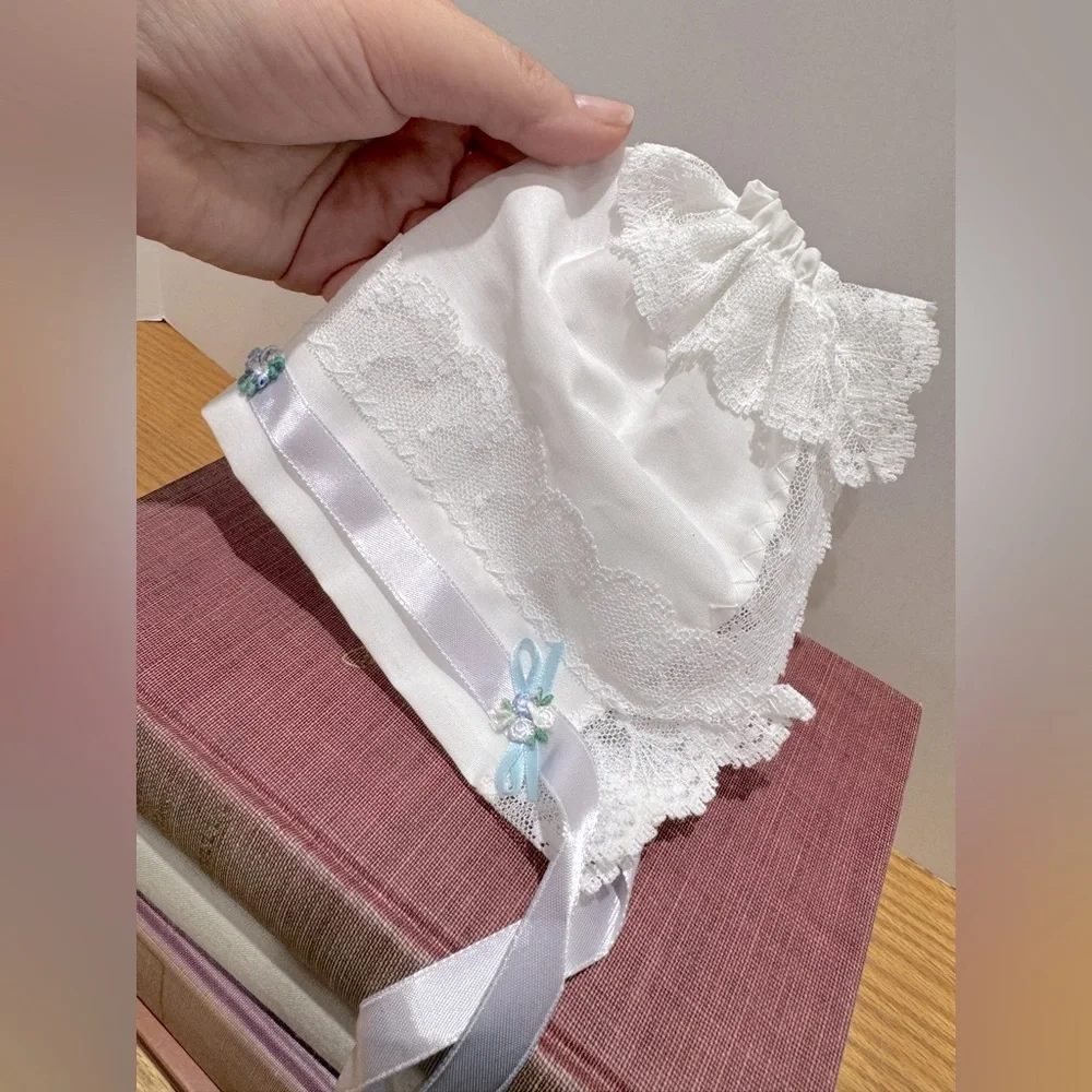 White Lace Baby Bonnet with Blue Accents